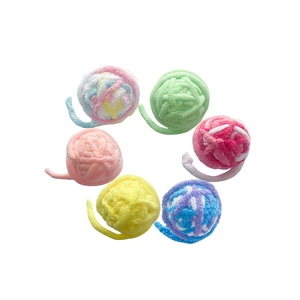 Set of six colorful plush yarn balls with bells for cat entertainment and dental health