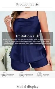 Detail of navy blue satin pajama set with washing care icons and fabric instructions