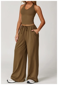 Detail of a brown ribbed v-neck halter sports top and high-waist drawstring pants set