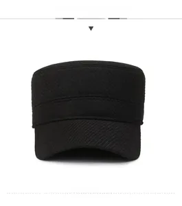 Detail of black winter cadet hat featuring a golden shield F logo on the side