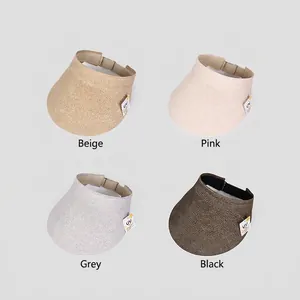 Four colors of UV protection straw sun visors with adjustable straps and tags