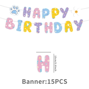 Detail of macaron-colored Happy Birthday banner with dog paw prints and floral patterns