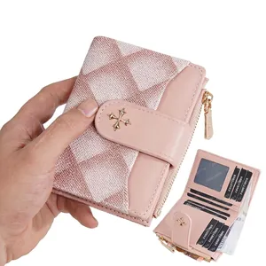 Women short pink quilted folding wallet with gold cross clasp and multi-card slots