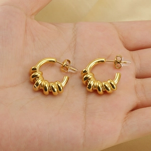 Boucles d'oreilles créoles torsadées en acier inoxydable doré 18 carats pour femme