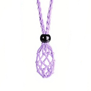Detailed view of handmade purple woven net pouch pendant with black bead for crystals