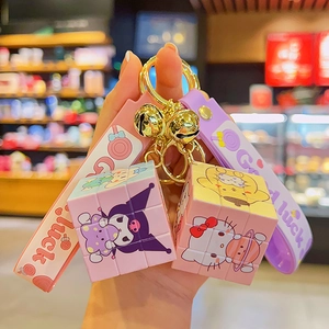 Cartoon Kuromi Rubik's Cube keychain with colorful silicone strap and gold bell