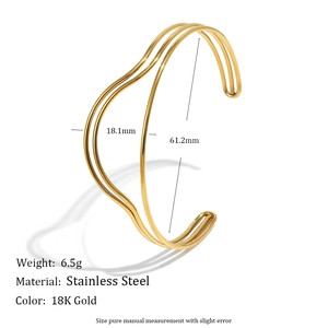 Detail view of 18K gold stainless steel wavy bangle with precise size measurements