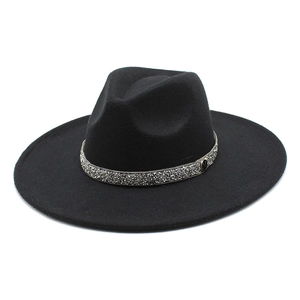 Close-up of black cashmere fedora hat with silver rhinestone band and metal M button