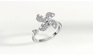 Close-up of S925 sterling silver hallmark on spinner ring with clover zirconia detail