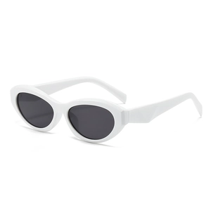 Trendy retro oval sunglasses with thick white frames and dark grey lenses in a 45-degree view