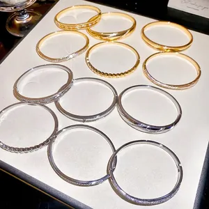 Elegant 18k gold plated bracelets with zircons in various minimalist designs