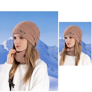 Dusty pink knitted beanie and neck warmer set for women featuring diamond patterns