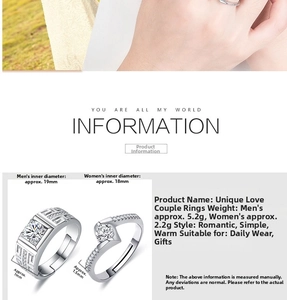 Detail view of silver couple rings with adjustable bands and sparkling inlaid diamonds