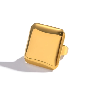 Close-up of a polished square 18K gold-plated stainless steel ring on a white background
