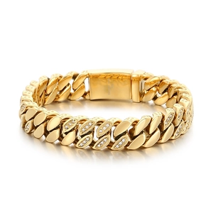 Golden 12mm Cuban link bracelet with diamond accents and box clasp on white background