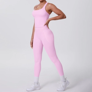 Detail view of pink yoga set fabric showing stretch fit and soft brushed texture