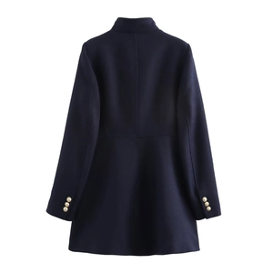 Rear view of long slim-fit wool coat featuring decorative gold buttons on cuffs