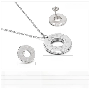 Detail of stainless steel MOM heart necklace and earrings set with crystal inlay
