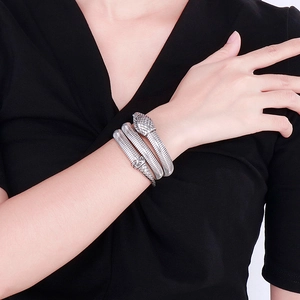 Silver multi-wrap cobra snake bracelet in stainless steel with detailed scales on wrist