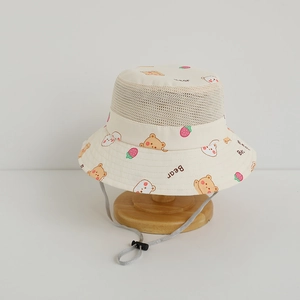 Detail of kids mesh sun hat featuring cartoon bear print and adjustable chin strap