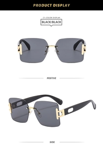 Close-up of square rimless sunglasses in black with gold metal accents and side view