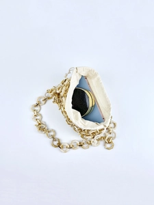 Unique beige resin hexagonal link chain bucket bag with drawstring canvas inner lining