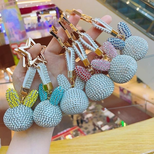 Sparkling rhinestone rabbit keychains in various colors with golden star clips