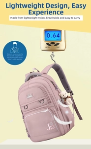 Lightweight 0.64kg pink nylon backpack for students featuring a cute teddy bear pendant