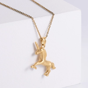Minimalist golden unicorn animal pendant necklace with a sandblasted matte finish