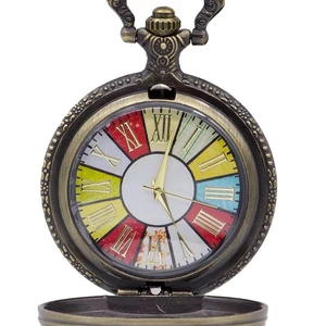 Macro detail of bronze pocket watch with colorful Roman numeral dial and ornate carvings