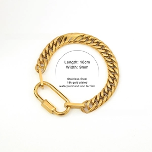 Detail showing 18cm long and 9mm wide 18k gold plated cuban link bracelet with carabiner clasp