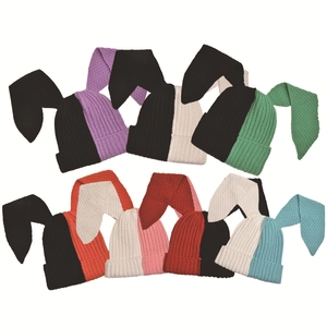 Unisex knitted beanie featuring long rabbit ears and a two-tone split-color design
