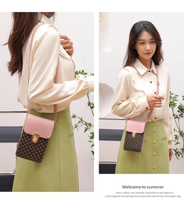 Close-up of pink leather flap and brown geometric pattern on mini crossbody handbag