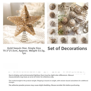 Detailed view of champagne gold Christmas tree topper star and assorted ornament set