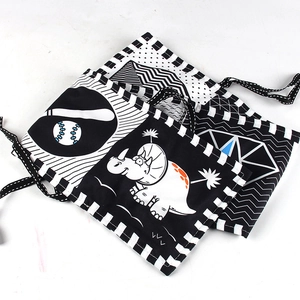 High contrast black and white baby cloth book with animal patterns and ribbons for crib