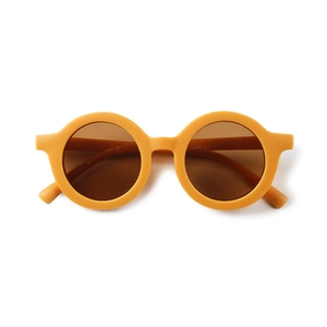 Fashionable round mustard yellow kids sunglasses with dark brown lenses for sun protection