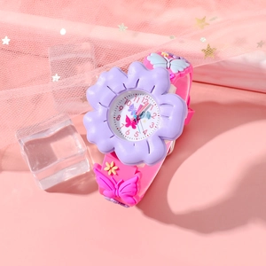 Macro shot of a pink kids watch with purple floral silicone case and 3D butterfly decor