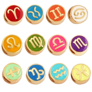 Macro display of 12 zodiac charms in colorful enamel with gold-plated metal finish