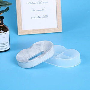 Detail showing translucent silicone soap dish mold with a marble-textured resin tray