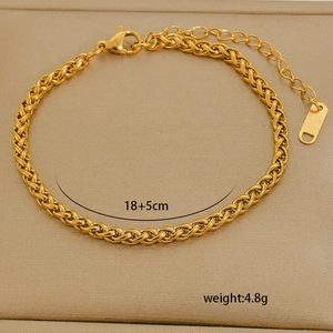 Macro detail of 18K gold plated wheat chain bracelet showing 18+5cm size and weight