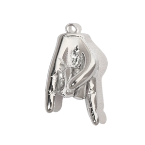 Detailed view of silver stainless steel hand gesture charm with polished metal finish