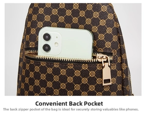 Detail of the rear anti-theft zipper pocket holding a smartphone on leopard clover bag