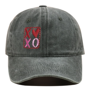 Detail of vintage gray washed cotton baseball cap with XOXO and heart embroidery