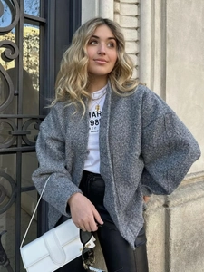 Women's loose grey wool jacket with drop shoulders and a stylish Y2K street style look
