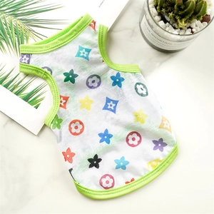 Breathable mesh pet vest with colorful floral print and green trim for small dogs and cats