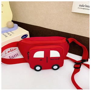 Detail view of red car-shaped kids chest bag with adjustable strap and logo print