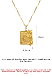 Detail of gold titanium steel pendant with embossed moon and star patterns on square plate