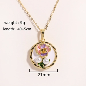 Detail view of gold floral pendant with pearls, weight 9g, length 40+5cm
