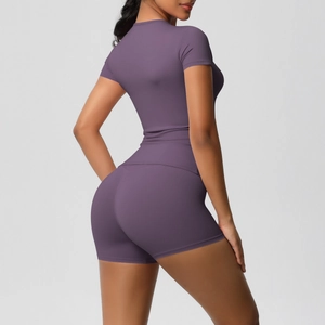 Macro detail of seamless Morandi purple athletic set showing high-stretch textured fabric