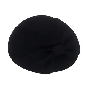Elegant black wool beret with large bow decoration for women, autumn and winter style